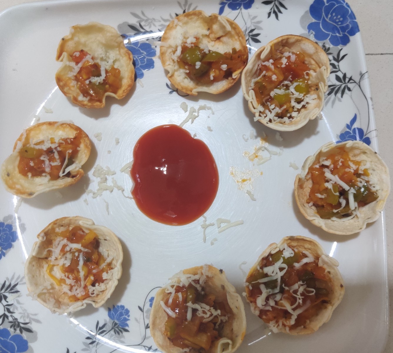 A close-up plate of Mumbai-style chaat, part of the Hurry Curry street-food menu